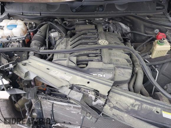 2014 Volkswagen Touareg Sport with VIN WVGEF9BP2ED007904, listed as a IAAI auction lot 41960811 with 126,230 mi miles and . Bid and sale history available at DreamBid. Image 10.