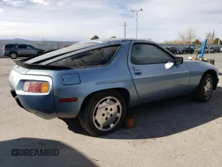 1985 Porsche 928 z VIN WP0JB092XFS860634, wystawiony jako Copart lot #49650775 z przebiegiem 140 644 mil mil oraz Tytuł czysty. Historia ofert i sprzedaży dostępna na DreamBid. Obrazek 3.