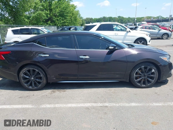 2016 Nissan Maxima SL with VIN 1N4AA6AP5GC393122, listed as a IAAI auction lot 42523884 with 116,659 mi miles and . Bid and sale history available at DreamBid. Image 13.