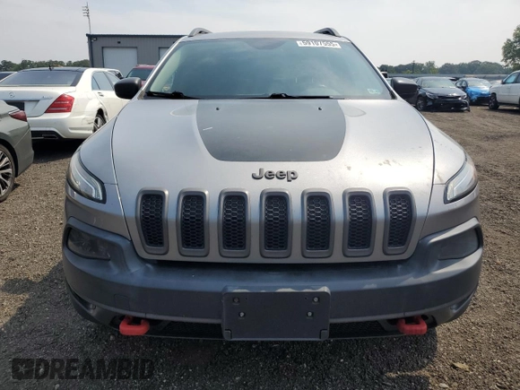 2015 Jeep Cherokee Trailhawk z VIN 1C4PJMBS5FW778852, wystawiony jako Copart lot #59107555 z przebiegiem Nie podano mil oraz Czysty tytuł • Clean title. Historia ofert i sprzedaży dostępna na DreamBid. Obrazek 5.