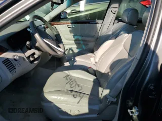 2006 Cadillac DTS 1SC z VIN 1G6KD57Y76U237062, wystawiony jako Copart lot #70920534 z przebiegiem 84 589 mil mil oraz Szkoda całkowita • Salvage title. Historia ofert i sprzedaży dostępna na DreamBid. Obrazek 7.
