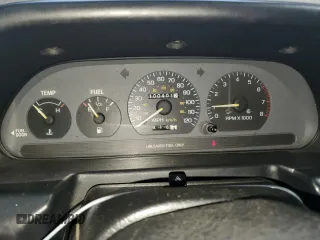 1995 Ford Escort z VIN 3FASP13J7SR205967, wystawiony jako Copart lot #73087444 z przebiegiem 100 401 mil mil oraz Szkoda całkowita • Salvage title. Historia ofert i sprzedaży dostępna na DreamBid. Obrazek 9.