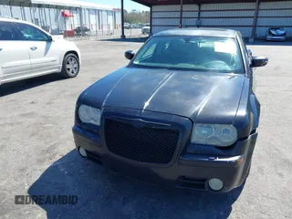 2005 Chrysler 300 with VIN 2C3AA63HX5H649107, listed as a IAAI auction lot 41748562 with 173,803 mi miles. Bid and sale history available at carsss.com. Image 12.