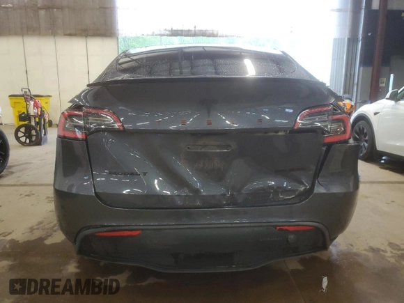 2021 Tesla Model Y Long Range with VIN 5YJYGDEE0MF076660, listed as a Copart auction lot 55957365 with 80,432 mi miles and Salvage Title. Bid and sale history available at DreamBid. Image 6.