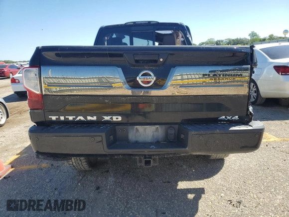 2017 Nissan Titan Platinum Reserve z VIN 1N6BA1F45HN546567, wystawiony jako Copart lot #73242964 z przebiegiem Nie podano mil oraz Szkoda całkowita • Salvage title. Historia ofert i sprzedaży dostępna na DreamBid. Obrazek 6.