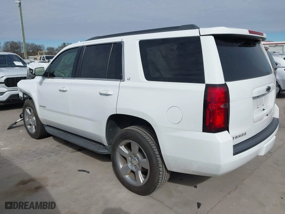 2018 Chevrolet Tahoe LT with VIN 1GNSCBKC0JR193421, listed as a IAAI auction lot 41241454 with 115,663 mi miles. Bid and sale history available at carsss.com. Image 3.