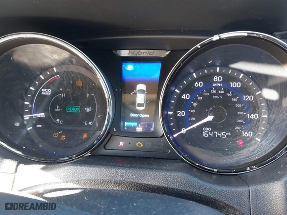 2013 Hyundai Sonata Hybrid Limited with VIN KMHEC4A40DA090333, listed as a IAAI auction lot 41479624 with 164,745 mi miles. Bid and sale history available at carsss.com. Image 7.