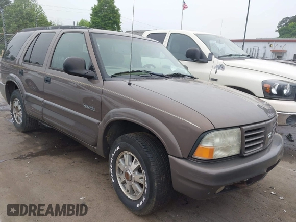1998 Oldsmobile Bravada z VIN 1GHDT13W6W2727777, wystawiony jako IAAI lot #42103153 z przebiegiem 187 176 mil mil oraz . Historia ofert i sprzedaży dostępna na DreamBid. Obrazek 1.