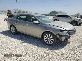 2016 Lincoln MKS z VIN 1LNHL9DK8GG600661, wystawiony jako Copart lot #49648655 z przebiegiem 56 655 mil mil oraz Szkoda całkowita • Salvage title. Historia ofert i sprzedaży dostępna na DreamBid. Obrazek 4.