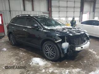 2014 Mazda CX-9 Grand Touring z VIN JM3TB2DA0E0437274, wystawiony jako IAAI lot #41555084 z przebiegiem 96 515 mil mil oraz . Historia ofert i sprzedaży dostępna na DreamBid. Obrazek 1.