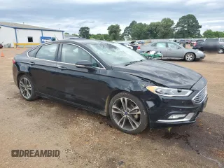 2017 Ford Fusion Titanium with VIN 3FA6P0K90HR221889, listed as a Copart auction lot 55643945 with 126,621 mi miles and Salvage title. Bid and sale history available at DreamBid. Image 4.