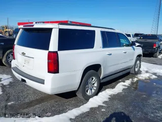 2019 Chevrolet Suburban LT with VIN 1GNSCHKC9KR176962, listed as a IAAI auction lot 41283544 with 112,360 mi miles. Bid and sale history available at carsss.com. Image 4.