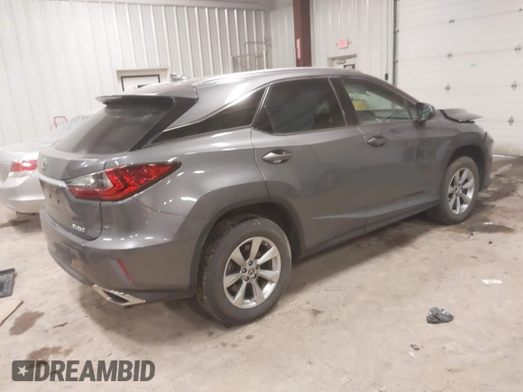 2019 Lexus RX with VIN 2T2BZMCA5KC197990, listed as a IAAI auction lot 41739917 with 74,469 mi miles. Bid and sale history available at carsss.com. Image 4.