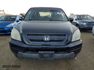 2004 Honda Pilot EX with VIN 2HKYF18604H614460, listed as a Copart auction lot 87947685 with 219,926 mi miles and Salvage Title. Bid and sale history available at carsss.com. Image 5.