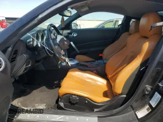 2007 Nissan 350Z with VIN JN1BZ34D27M504665, listed as a Copart auction lot 74428404 with 142,778 mi miles and Salvage Title. Bid and sale history available at DreamBid. Image 7.