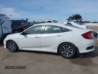 2017 Honda Civic EX z VIN 2HGFC2F76HH514686, wystawiony jako IAAI lot #41936117 z przebiegiem 56 711 mil mil oraz . Historia ofert i sprzedaży dostępna na DreamBid. Obrazek 14.