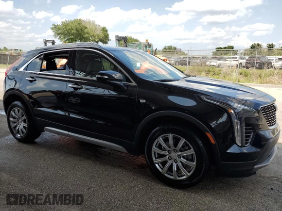 2023 Cadillac XT4 FWD Premium Luxury with VIN 1GYFZCR43PF113935, listed as a Copart auction lot 58326575 with 54,481 mi miles and Clean title. Bid and sale history available at DreamBid. Image 4.