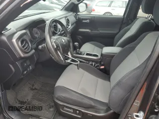 2021 Toyota Tacoma 4WD SR5 with VIN 3TMDZ5BN9MM110528, listed as a Copart auction lot 49298555 with 29,929 mi miles and Salvage Title. Bid and sale history available at carsss.com. Image 7.