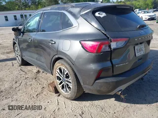 2020 Ford Escape Titanium Hybrid with VIN 1FMCU9DZ2LUA86600, listed as a IAAI auction lot 42059830 with 76,998 mi miles and . Bid and sale history available at DreamBid. Image 3.