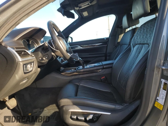 2017 BMW 7 Series 740i with VIN WBA7E2C32HG740988, listed as a Copart auction lot 49613465 with 63,646 mi miles and Salvage Title. Bid and sale history available at carsss.com. Image 7.