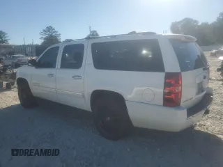 2014 Chevrolet Suburban LTZ with VIN 1GNSCKE02ER105377, listed as a Copart auction lot 76697154 with 229,461 mi miles and Salvage title. Bid and sale history available at DreamBid. Image 3.