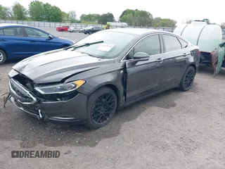 2018 Ford Fusion Titanium z VIN 3FA6P0K9XJR160993, wystawiony jako IAAI lot #41938148 z przebiegiem 137 410 mil mil oraz . Historia ofert i sprzedaży dostępna na DreamBid. Obrazek 2.