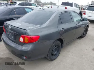 2009 Toyota Corolla with VIN 1NXBU40E49Z165082, listed as a IAAI auction lot 41881134 with 261,282 mi miles. Bid and sale history available at carsss.com. Image 4.