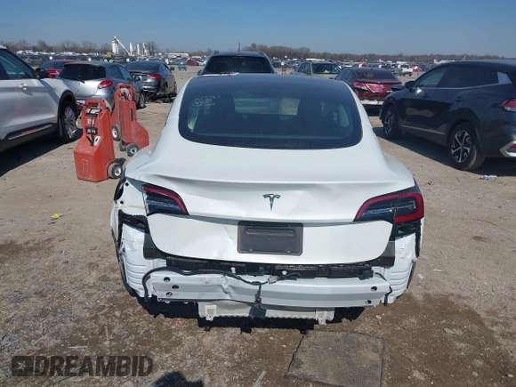 2023 Tesla Model 3 z VIN 5YJ3E1EAXPF505951, wystawiony jako IAAI lot #41535421 z przebiegiem Nie podano mil oraz . Historia ofert i sprzedaży dostępna na DreamBid. Obrazek 16.