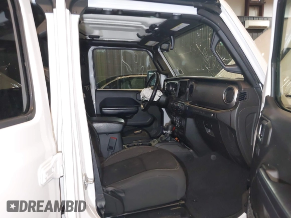 2021 Jeep Wrangler Unlimited Freedom with VIN 1C4HJXDNXMW681267, listed as a IAAI auction lot 42026181 with 40,143 mi miles and . Bid and sale history available at DreamBid. Image 5.