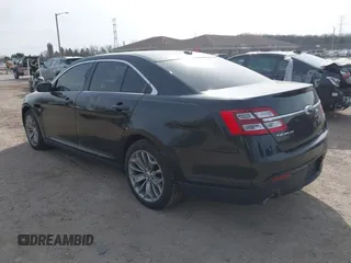 2013 Ford Taurus Limited with VIN 1FAHP2F80DG114817, listed as a IAAI auction lot 41865803 with 207,132 mi miles. Bid and sale history available at carsss.com. Image 3.