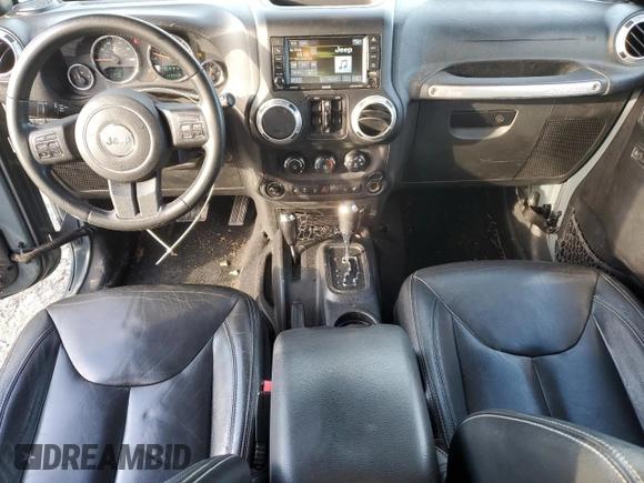 2015 Jeep Wrangler Unlimited Rubicon with VIN 1C4BJWFG7FL732694, listed as a Copart auction lot 42977435 with 128,759 mi miles and Salvage Title. Bid and sale history available at carsss.com. Image 8.