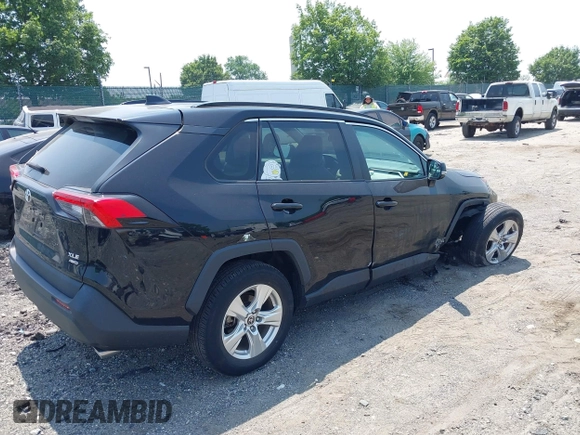 2021 Toyota RAV4 XLE with VIN 2T3P1RFV4MC255062, listed as a IAAI auction lot 42371268 with 34,285 mi miles and . Bid and sale history available at DreamBid. Image 4.