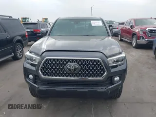 2018 Toyota Tacoma SR with VIN 5TFCZ5AN6JX127774, listed as a IAAI auction lot 41801158 with 28,161 mi miles and . Bid and sale history available at DreamBid. Image 12.