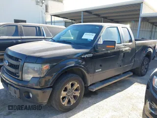 2014 Ford F-150 XL with VIN 1FTFX1CT7EFD11303, listed as a IAAI auction lot 41414356 with 183,586 mi miles. Bid and sale history available at carsss.com. Image 2.