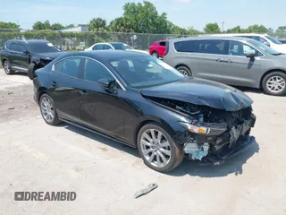 2023 Mazda 3 S Select with VIN 3MZBPABMXPM356101, listed as a IAAI auction lot 41975209 with 45,519 mi miles and . Bid and sale history available at DreamBid. Image 1.