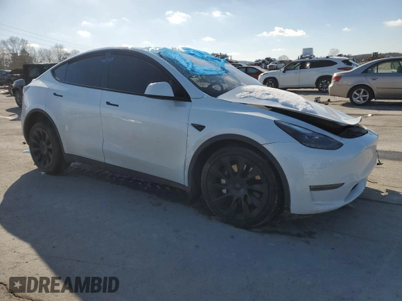 2023 Tesla Model Y Long Range with VIN 7SAYGAEE3PF767171, listed as a Copart auction lot 46057645 with Not Provided miles and Salvage Title. Bid and sale history available at DreamBid. Image 4.