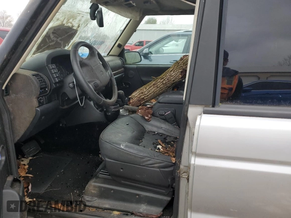 2003 Land Rover Discovery with VIN SALTR16403A785761, listed as a Copart auction lot 76209084 with Not Provided miles and Salvage Title. Bid and sale history available at DreamBid. Image 7.