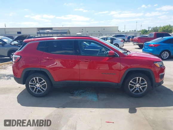 2017 Jeep Compass Latitude with VIN 3C4NJCBB2HT668657, listed as a IAAI auction lot 42027025 with 91,888 mi miles and . Bid and sale history available at DreamBid. Image 13.