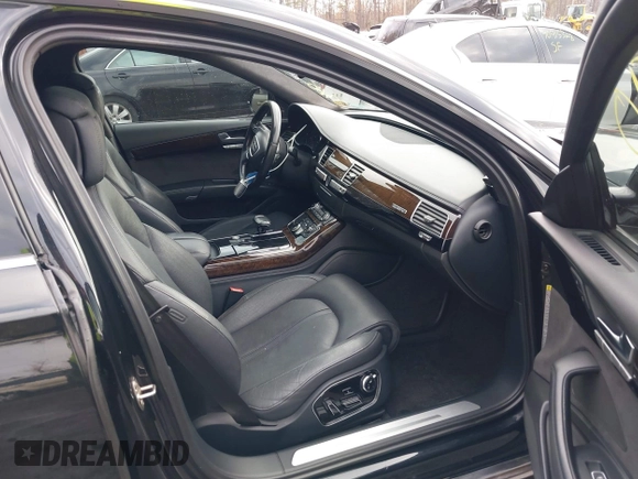 2012 Audi A8 L with VIN WAURVAFD8CN006917, listed as a IAAI auction lot 40877090 with 144,387 mi miles. Bid and sale history available at carsss.com. Image 5.