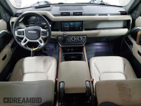 2024 Land Rover Defender S with VIN SALEJ7EX4R2283949, listed as a Copart auction lot 83841744 with 9,824 mi miles and Salvage title. Bid and sale history available at DreamBid. Image 8.
