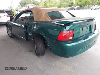 2001 Ford Mustang Deluxe z VIN 1FAFP44441F198354, wystawiony jako IAAI lot #42433701 z przebiegiem 69 328 mil mil oraz . Historia ofert i sprzedaży dostępna na DreamBid. Obrazek 3.