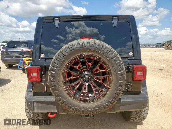 2020 Jeep Wrangler Unlimited Rubicon with VIN 1C4HJXFG5LW107933, listed as a Copart auction lot 62012515 with 60,115 mi miles and Salvage title. Bid and sale history available at DreamBid. Image 6.