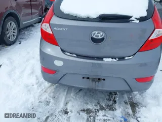 2014 Hyundai Accent GS with VIN KMHCT5AE1EU194495, listed as a IAAI auction lot 41609591 with 85,737 mi miles. Bid and sale history available at carsss.com. Image 16.