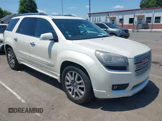 2014 GMC Acadia Denali with VIN 1GKKVTKD1EJ220183, listed as a IAAI auction lot 42230611 with 103,789 mi miles and . Bid and sale history available at carsss.com. Image 1.