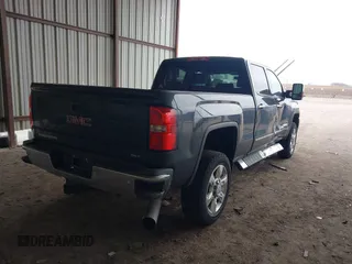 2017 GMC Sierra 2500HD SLT with VIN 1GT12TEY3HF232700, listed as a IAAI auction lot 41381275 with 217,148 mi miles. Bid and sale history available at carsss.com. Image 4.