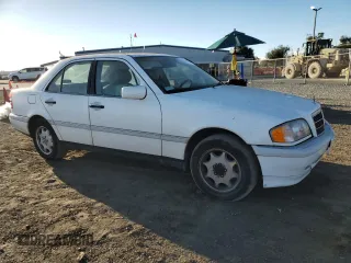 1994 Mercedes-Benz C 230/260/280/320 with VIN WDBHA28E6RF098536, listed as a Copart auction lot 77804734 with 181,285 mi miles and Clean Title. Bid and sale history available at carsss.com. Image 4.