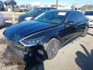 2021 Hyundai Sonata Hybrid Limited with VIN KMHL54JJ0MA017423, listed as a IAAI auction lot 41637455 with 39,555 mi miles. Bid and sale history available at carsss.com. Image 2.