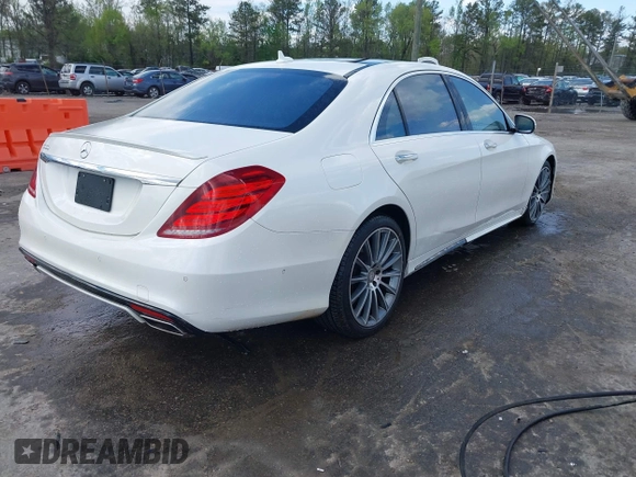 2015 Mercedes-Benz S 550 with VIN WDDUG8CB1FA190490, listed as a IAAI auction lot 42022684 with 68,930 mi miles and . Bid and sale history available at DreamBid. Image 4.