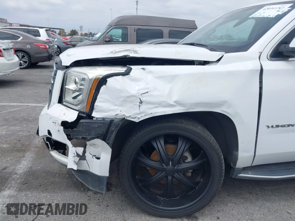 2017 GMC Yukon SLT with VIN 1GKS2BKC9HR125757, listed as a IAAI auction lot 42034182 with 72,333 mi miles. Bid and sale history available at carsss.com. Image 6.