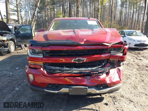 2018 Chevrolet Silverado 1500 LT with VIN 3GCUKREC4JG204672, listed as a IAAI auction lot 41638941 with 134,506 mi miles. Bid and sale history available at carsss.com. Image 6.